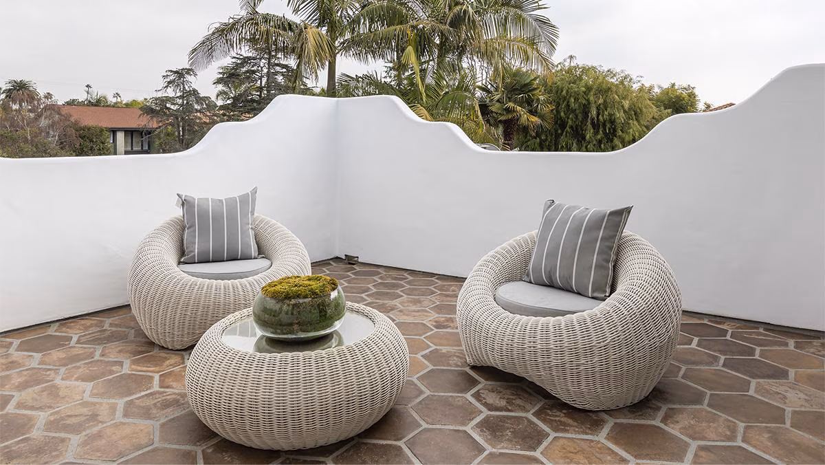 Outdoor patio featuring decorative tile flooring and modern seating area designed for Southern California outdoor living.