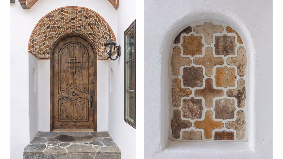 Outdoor entryway featuring natural stone detailing, textured surfaces, and architectural stone applications.