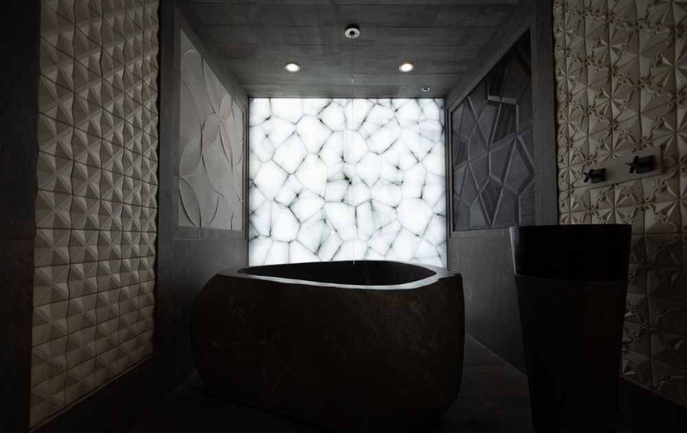 Luxury bathroom featuring dimensional tile wall installations at the Famosa Tile showroom in Costa Mesa.