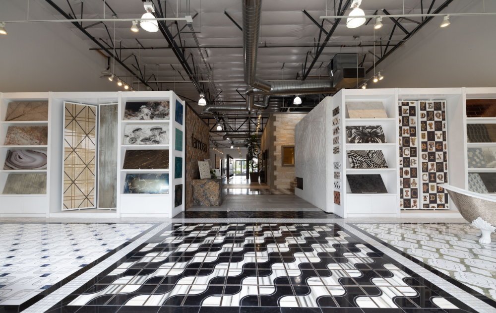 Wide view of the Famosa Tile showroom in Costa Mesa featuring curated luxury tile displays for interior designers and architects.
