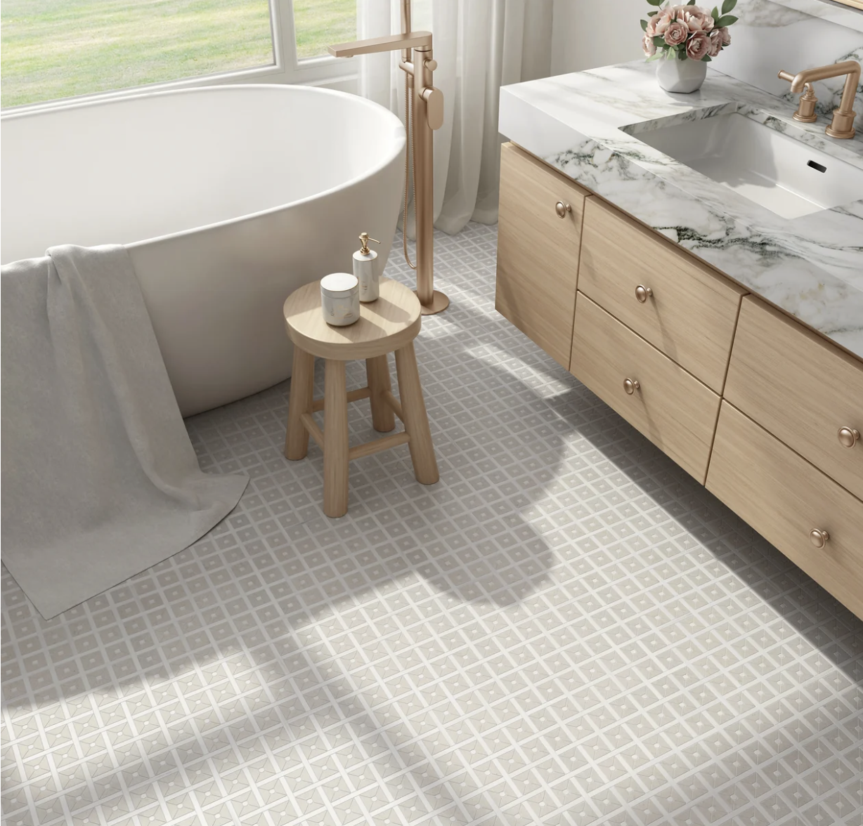 Bathroom featuring light tile flooring and a freestanding tub