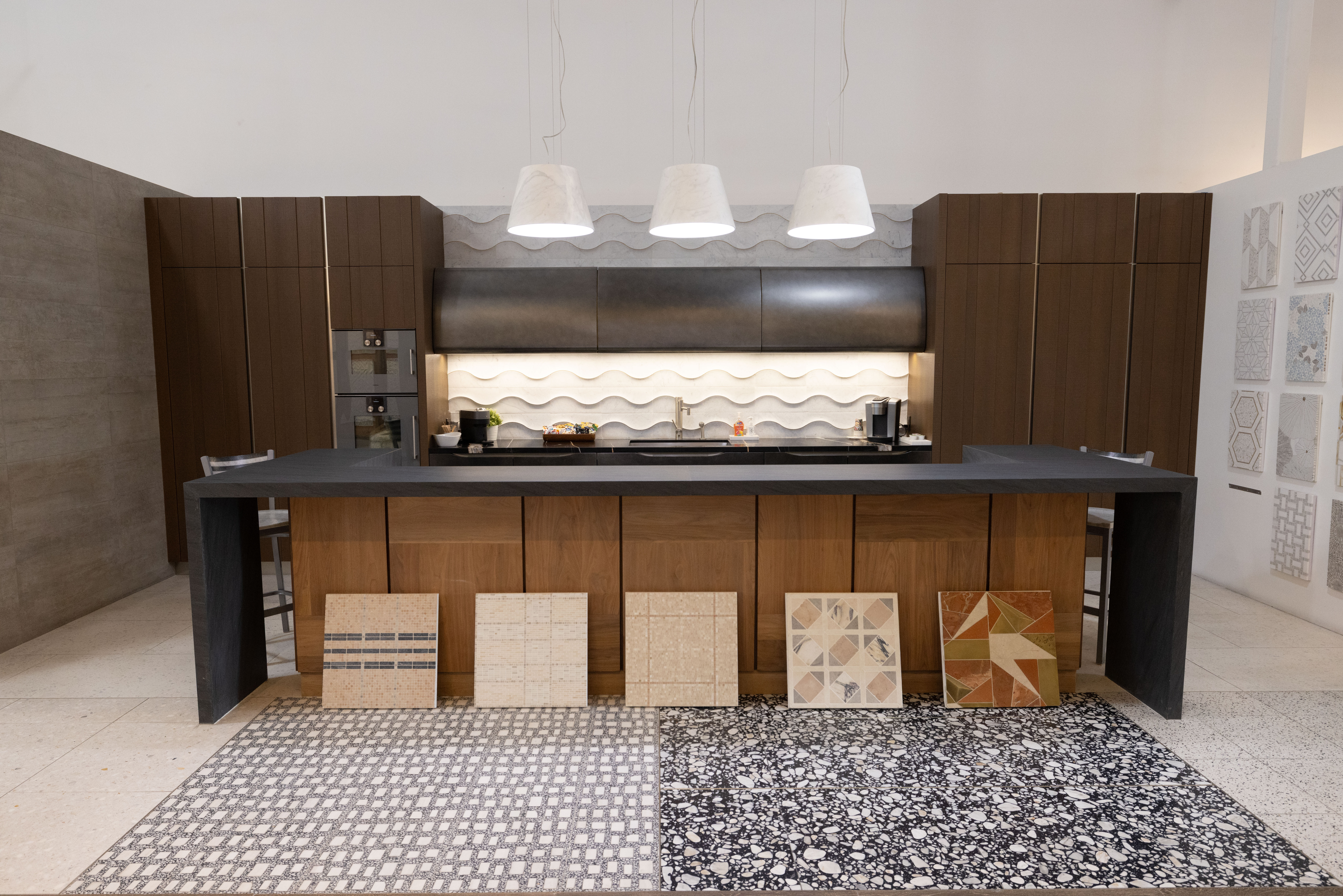Full-scale working kitchen installation inside the Famosa Tile showroom in Costa Mesa featuring luxury tile, cabinetry, and architectural surfaces for interior designers and homeowners.