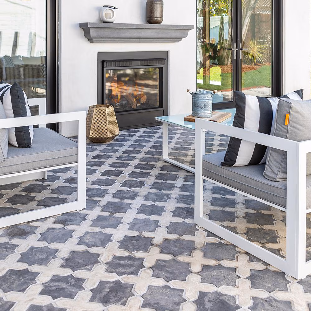 Patterned tile in an outdoor living space by Famosa Tile