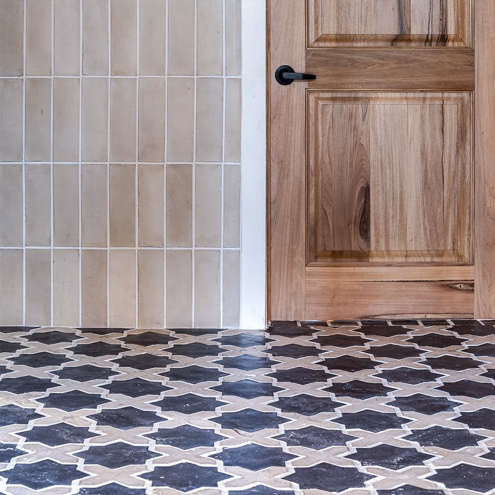 Patterned floor tile paired with neutral wall tile